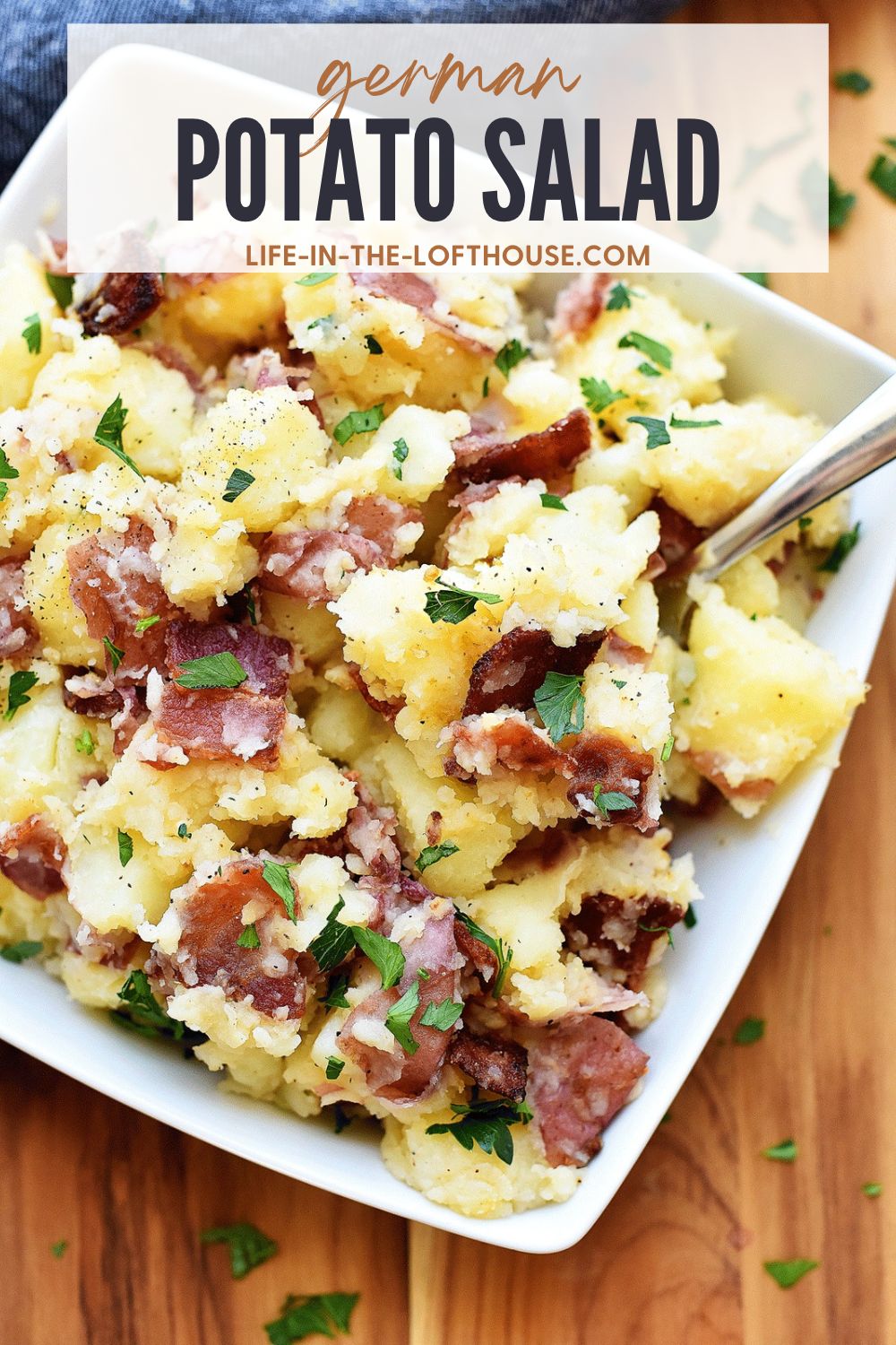 German Potato Salad is potatoes coated in a delicious and tangy dressing made of bacon, vinegar and Dijon mustard. Life-in-the-Lofthouse.com