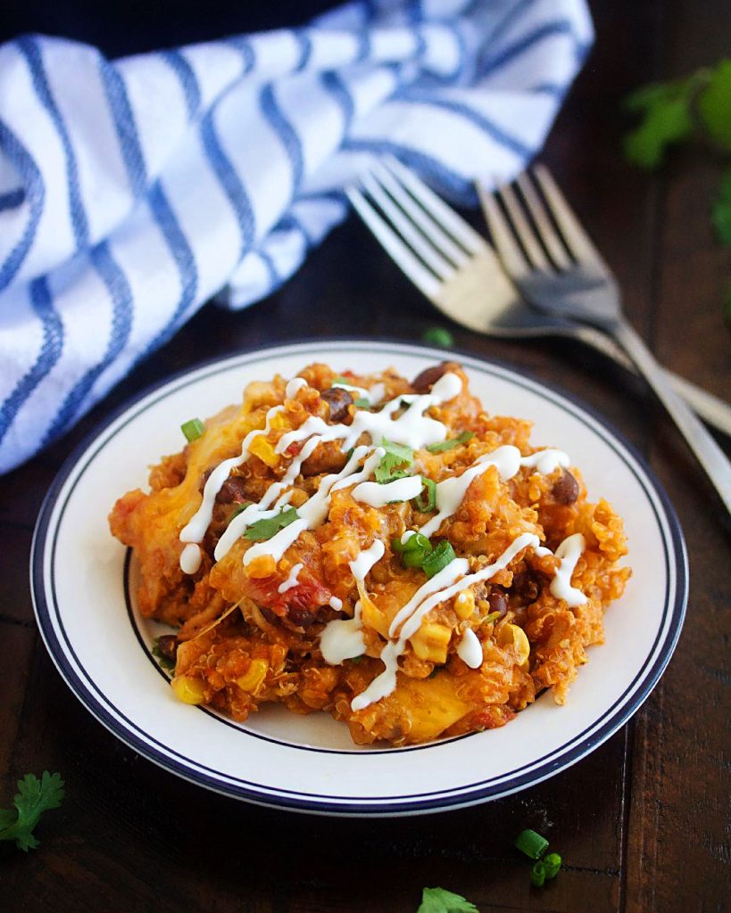 Slow Cooker Chicken Enchilada Quinoa is loaded with quinoa, veggies, ground chicken and topped with lots of cheese. Life-in-the-Lofthouse.com