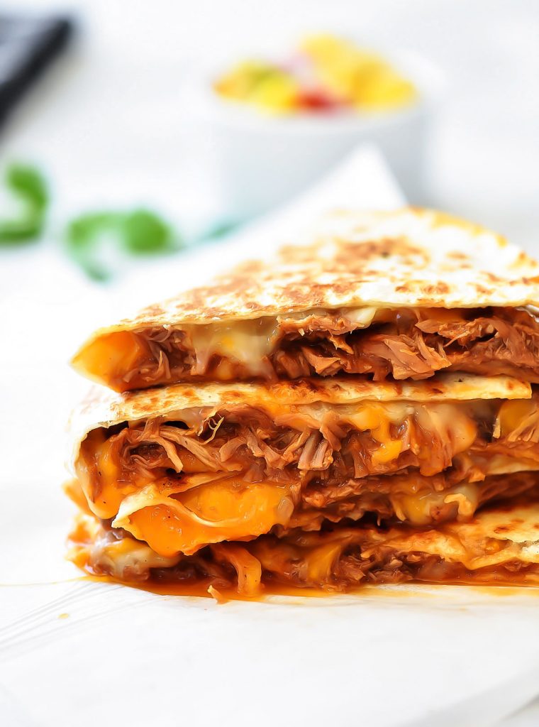 Sweet Pork Quesadillas start with savory, sweet shredded pork and loads of cheddar and Monterey jack cheese between two crispy flour tortillas. Life-in-the-Lofthouse.com