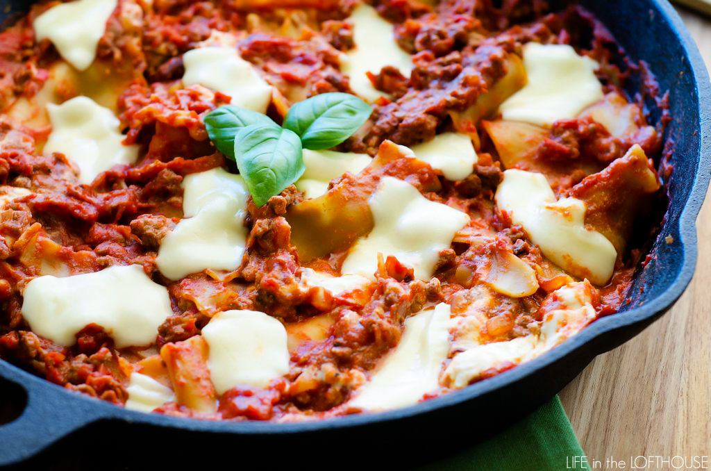 Easy Skillet Lasagna is a delicious lasagna made in just one skillet with ricotta and mozzarella cheese and fresh basil. Life-in-the-Lofthouse.com