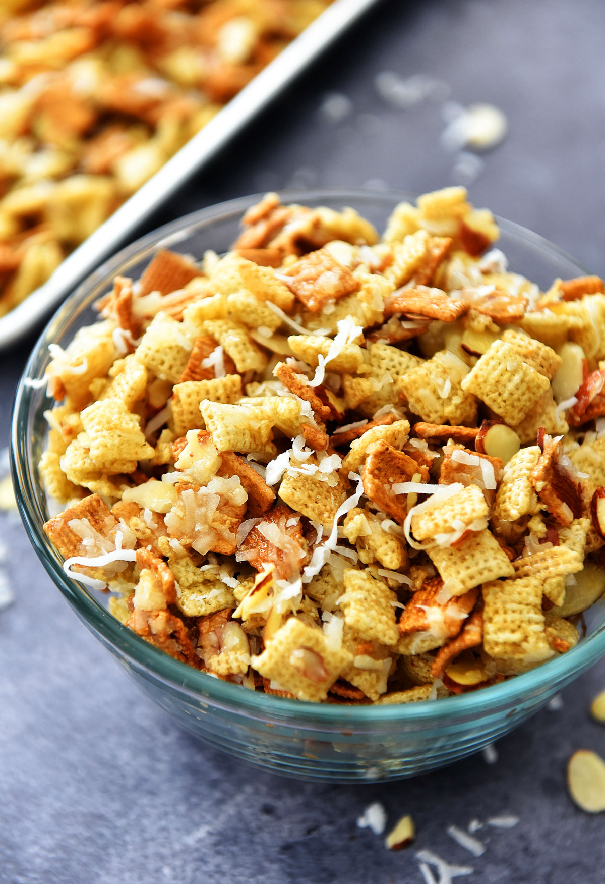 Gooey Chex Mix is a sweet and salty snack with coconut and almonds. Life-in-the-Lofthouse.com