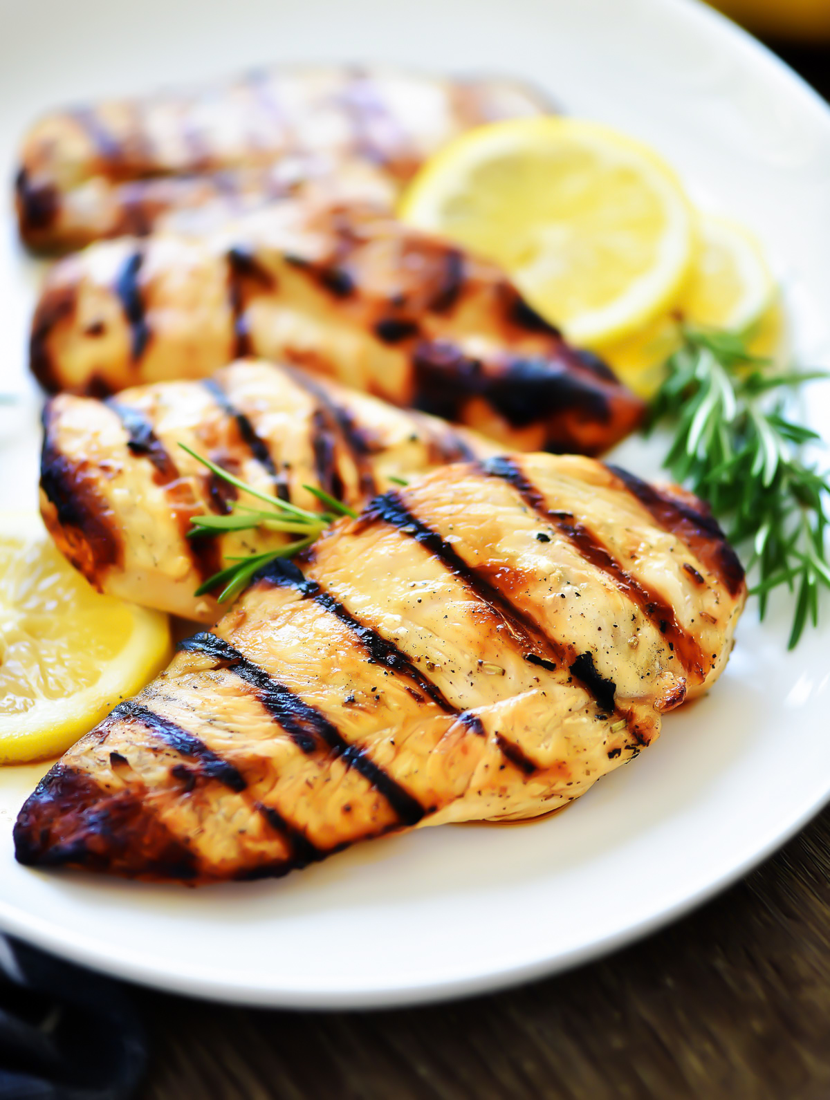 Grilled Lemon Chicken is tender pieces of chicken breast with lemon flavor. Life-in-the-Lofthouse.com