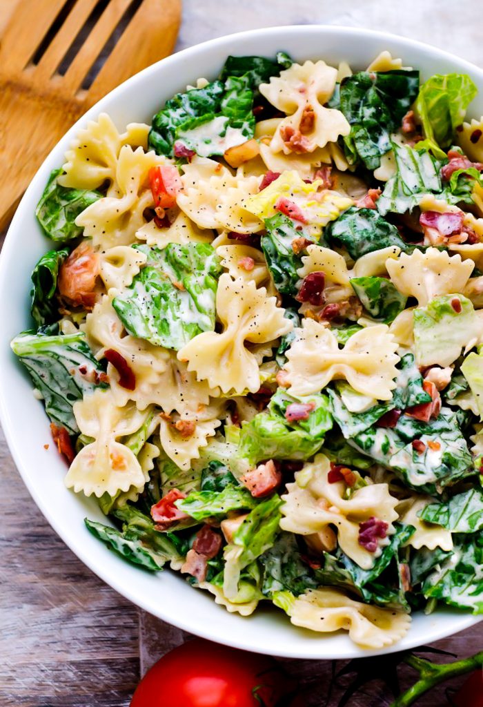 BLT Pasta Salad is filled with bacon, lettuce and tomato. It also includes pasta all covered in a creamy ranch dressing. Life-in-the-Lofthouse.com