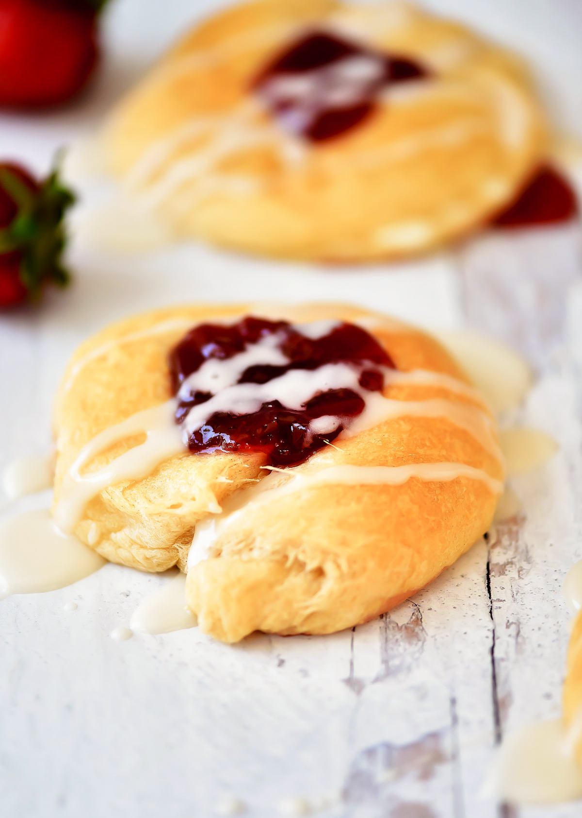 Strawberry Cheese Danishes are crescent rolls with a cream cheese filling and strawberry jam. 