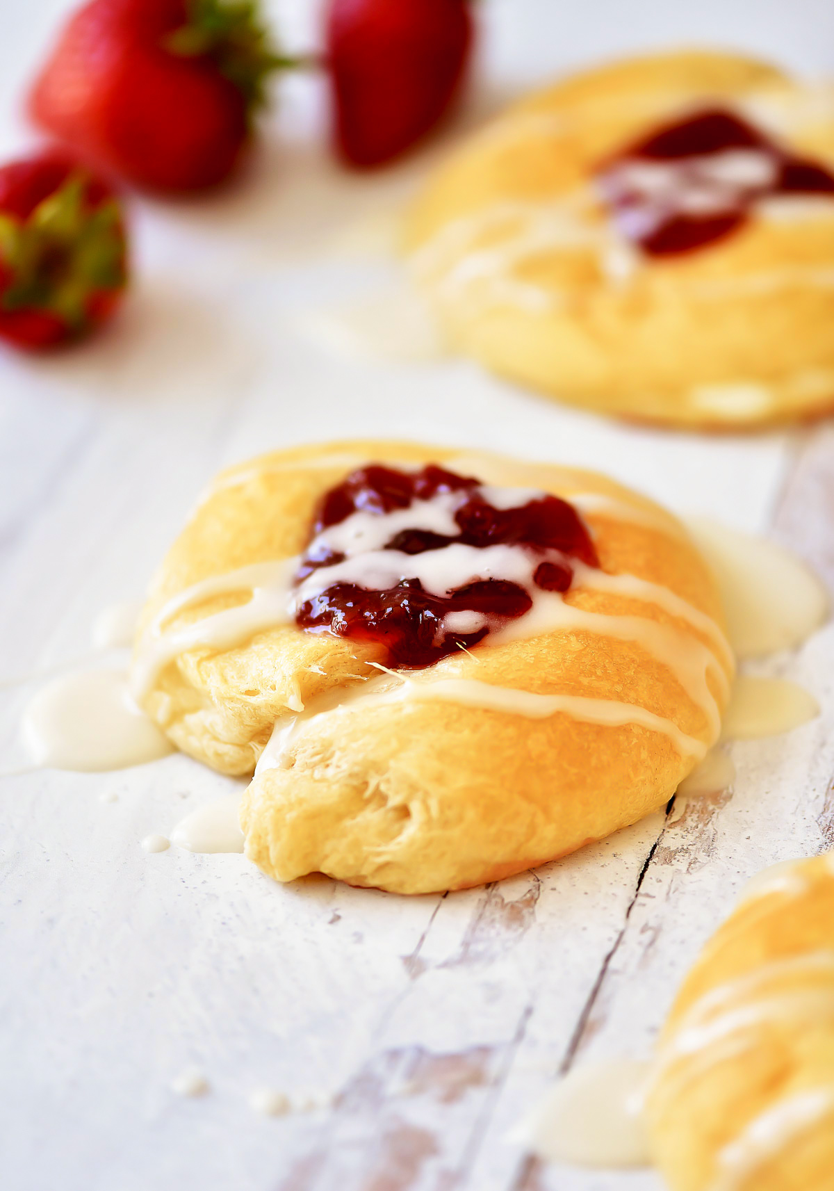 Strawberry Cheese Danishes are crescent rolls with a cream cheese filling and strawberry jam. 