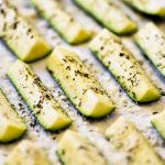 Baked zucchini covered in Parmesan cheese and full of Italian flavor. Life-in-the-Lofthouse.com