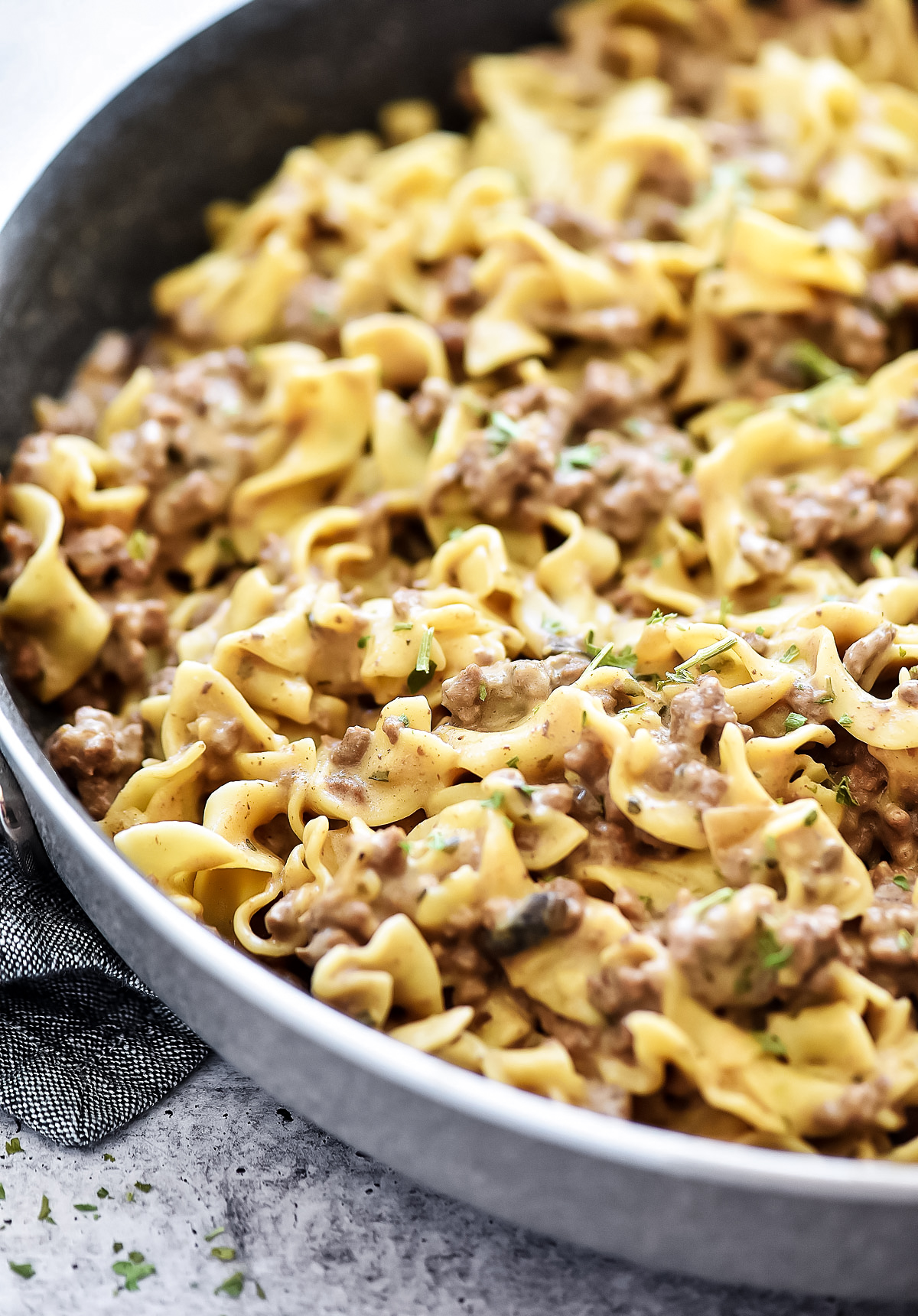Easy Beef Stroganoff is filled with ground beef and a mushroom sauce served over egg noodles. Life-in-the-Lofthouse.com