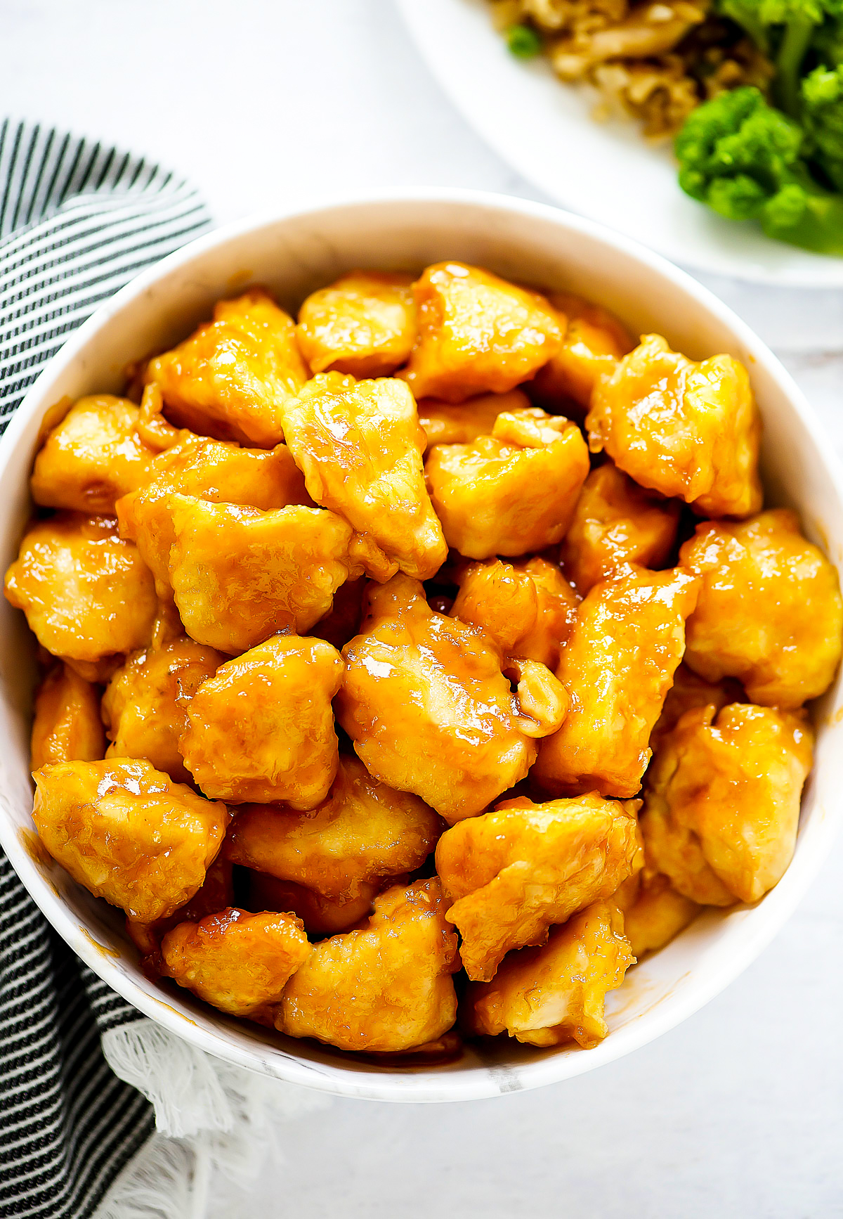 Sweet and Sour Chicken is bite-sized pieces of chicken covered in a delicious sweet and tangy sauce. Life-in-the-Lofthouse.com