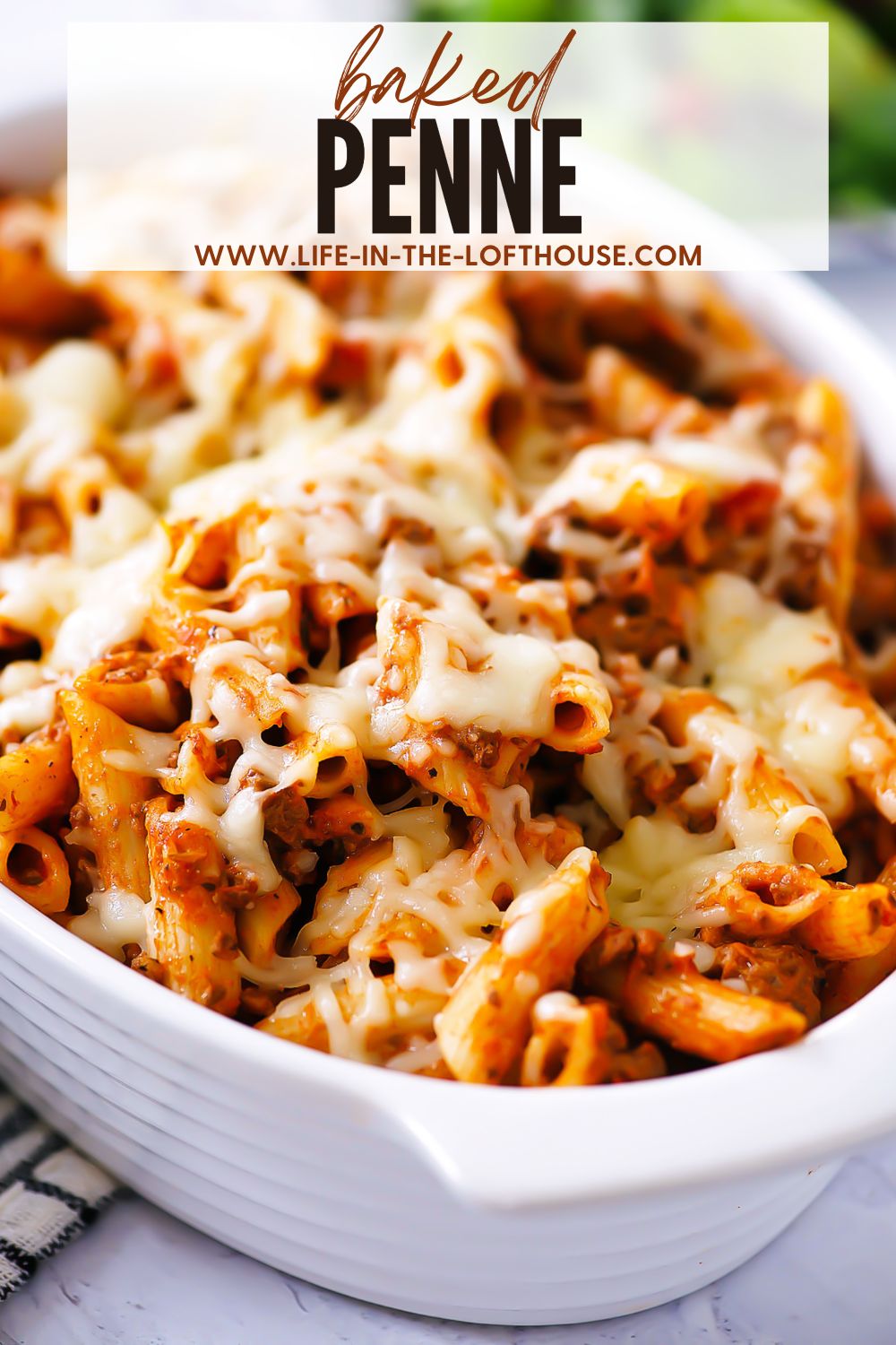 Baked Penne is a classic Italian-American dish with penne pasta baked in spaghetti sauce, cream cheese and Mozzarella cheese. Life-in-the-Lofthouse.com