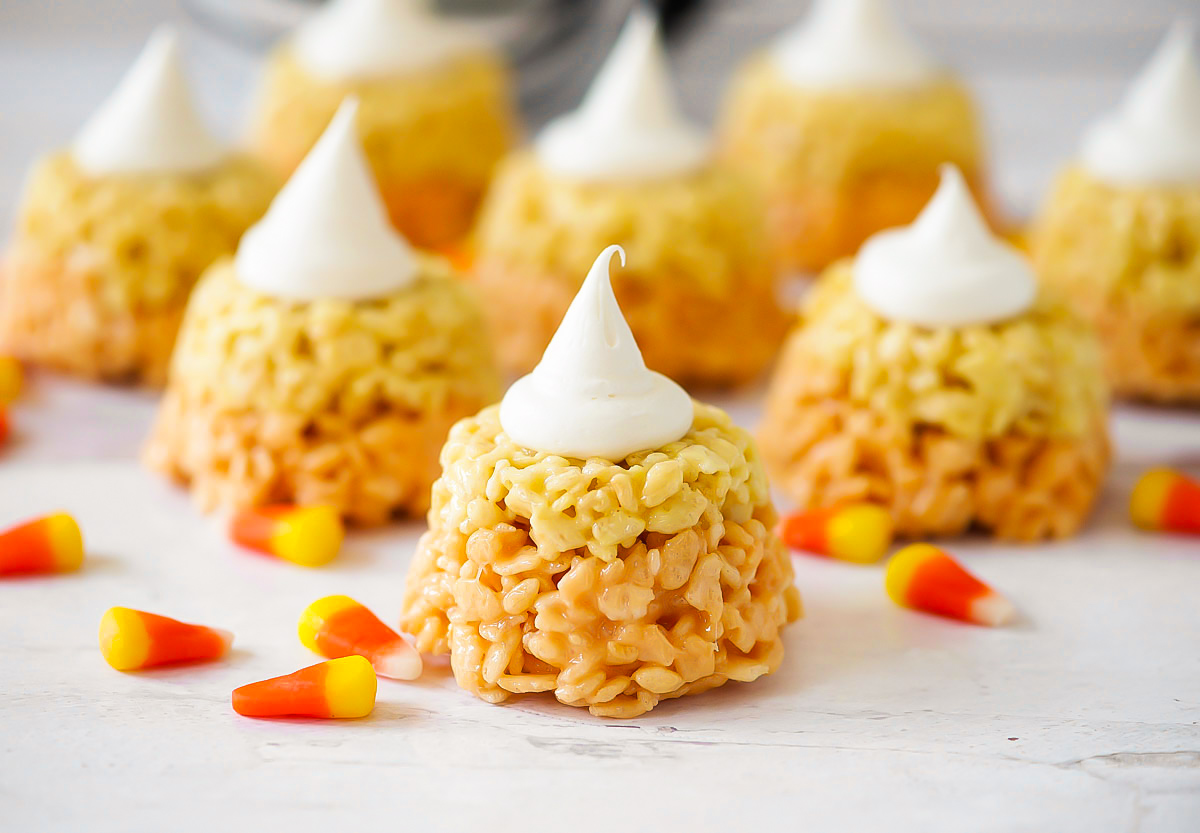 Candy Corn Rice Krispie Cupcakes are rice krispie treats colored and shaped just like a candy corn. Life-in-the-Lofthouse.com