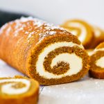 Soft pumpkin cake rolled up and filled with a creamy cream cheese filling. Life-in-the-Lofthouse.com