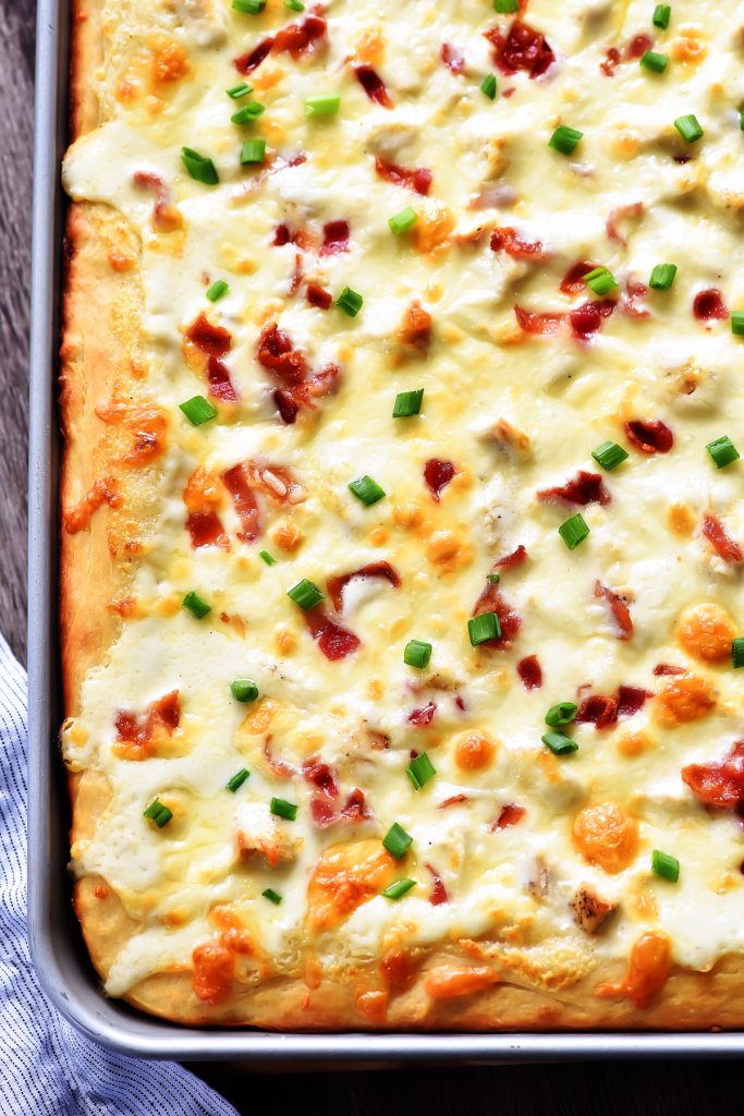 Chicken Alfredo Pizza baked on a sheet pan. Life-in-the-Lofthouse.com