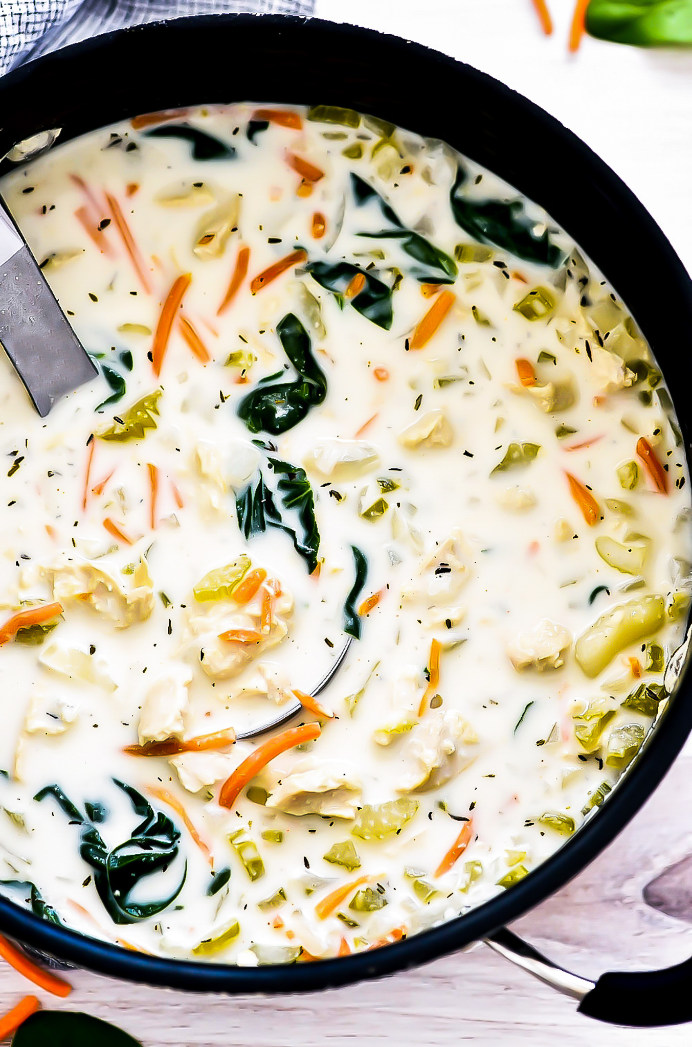 Chicken Gnocchi Soup is filled with tender chicken breast, potato gnocchi, carrots, spinach, celery and onion in a creamy chicken broth. Life-in-the-Lofthouse.com