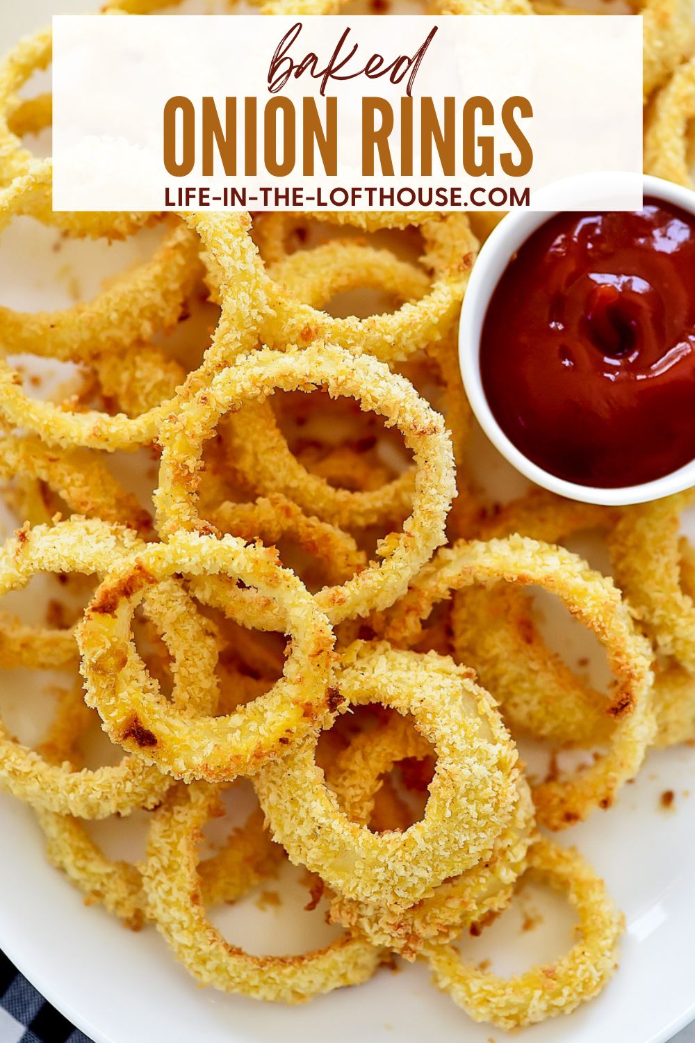 Delicious and crispy homemade Onion Rings that are baked in the oven. Life-in-the-Lofthouse