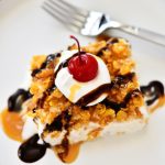 Fried Ice Cream Dessert has an amazing crust that coats a dreamy, cinnamon ice cream combo and is drizzled with chocolate and caramel sauce. Life-in-the-Lofthouse.com