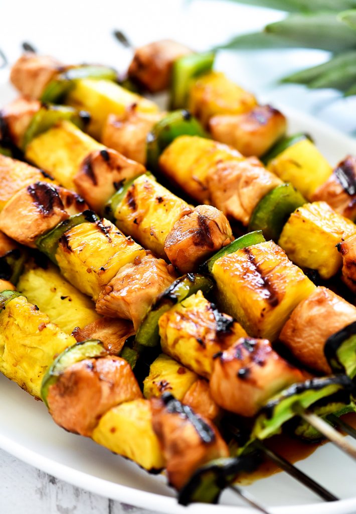 Teriyaki Chicken Kebabs are marinated pieces of chicken, with pineapple and bell pepper threaded onto skewers then grilled.