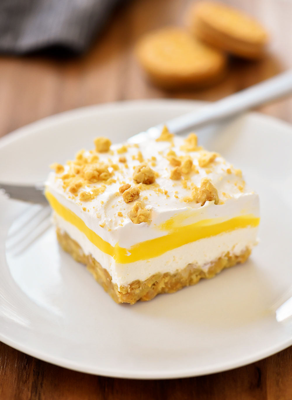 Heavenly Lemon Oreo Dessert has layers of golden oreo cookies, cream cheese, and lemon pudding. Life-in-the-Lofthouse.com