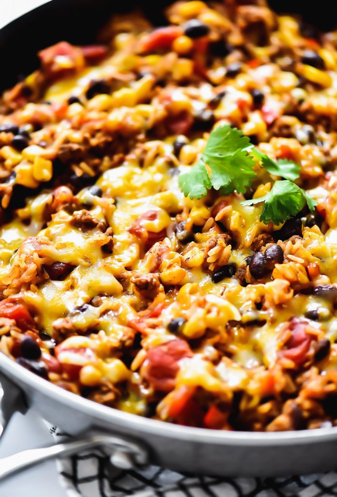 Beef Burrito Skillet is loaded with lean ground beef, jasmine rice, beans, cheese and more. Life-in-the-Lofthouse.com
