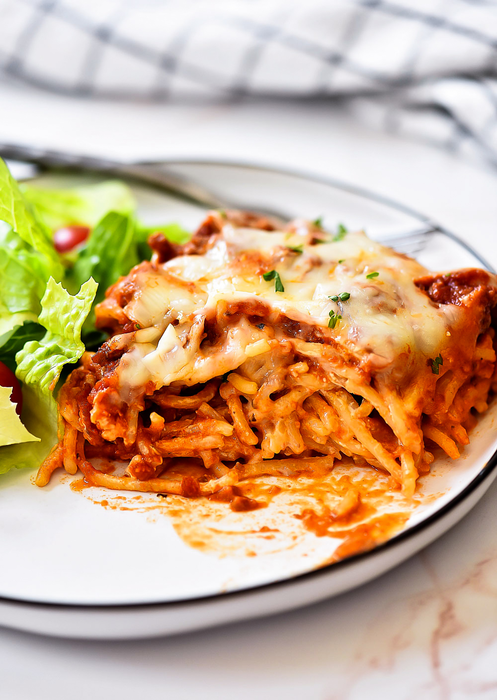 Baked Spaghetti is traditional spaghetti baked in the oven. Life-in-the-Lofthouse.com