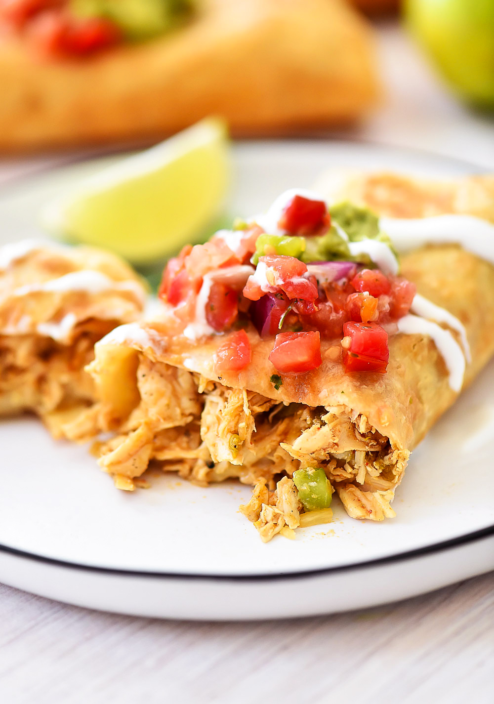 Chicken Chimichangas are filled with flavorful shredded chicken, Monterey jack cheese and diced green chilies. Life-in-the-Lofthouse.com
