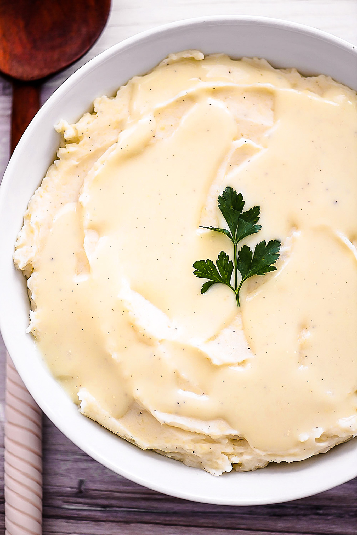 Creamy Parmesan mashed potatoes with perfect garlic flavor. Life-in-the-Lofthouse.com