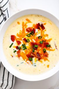 Creamy potato soup with bacon, cheese and green onions.