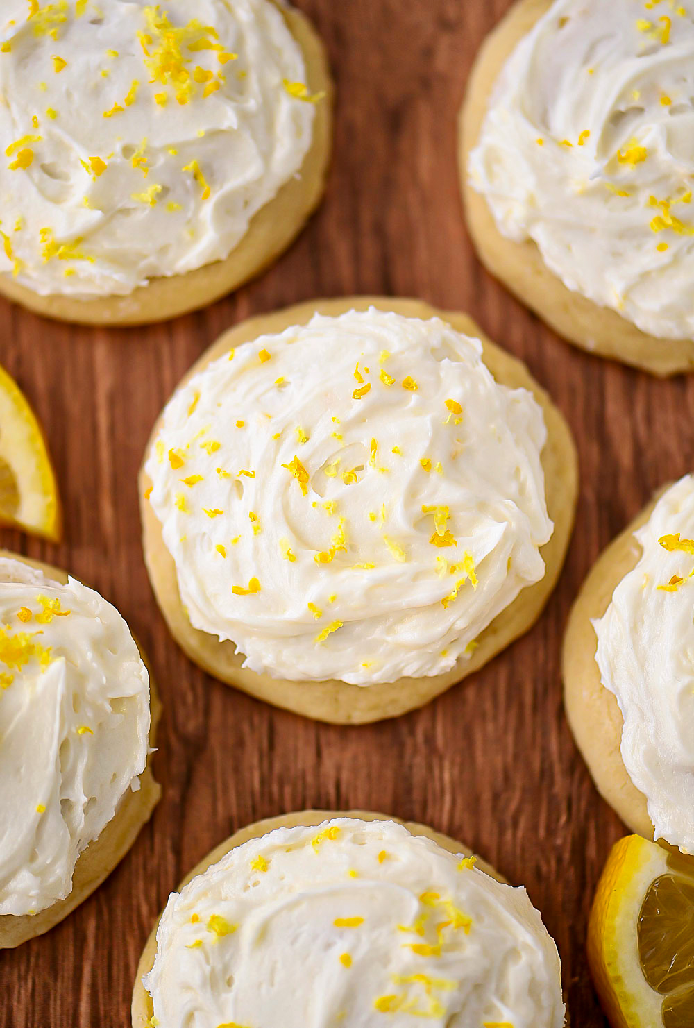 Lemon flavored sugar cookies with lemon buttercream frosting on top.