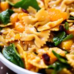 Mandarin Orange and Spinach Pasta Salad is bow tie pasta noodles coated in teriyaki sauce with oranges, spinach and dried cranberries. Life-in-the-Lofthouse.com