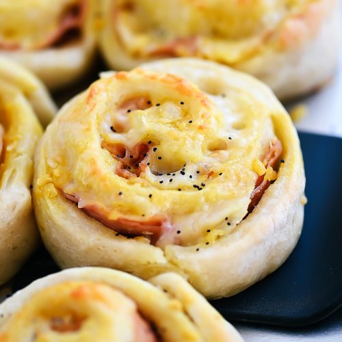 https://life-in-the-lofthouse.com/wp-content/uploads/2022/10/Baked-Ham-and-Cheese-Roll-Ups22-500x500.jpg