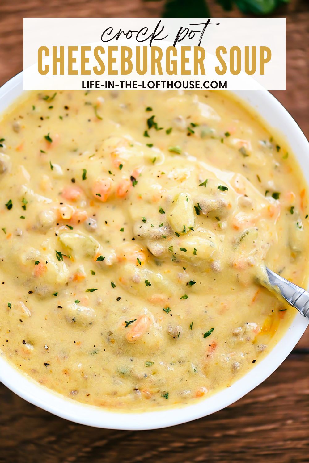 Cheeseburger Soup is a creamy and cheesy soup loaded with potatoes, ground beef, carrots and more. Life-in-the-Lofthouse.com