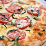 Margherita Pizza is topped with Mozzarella and Parmesan cheese, sliced tomatoes and fresh basil over pizza crust. Life-in-the-Lofthouse.com