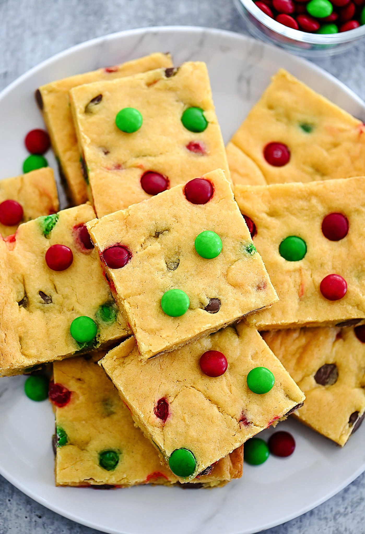 Cake Mix Cookie Bars are soft, chewy and loaded with chocolate chips and M&M's. Life-in-the-Lofthouse.com